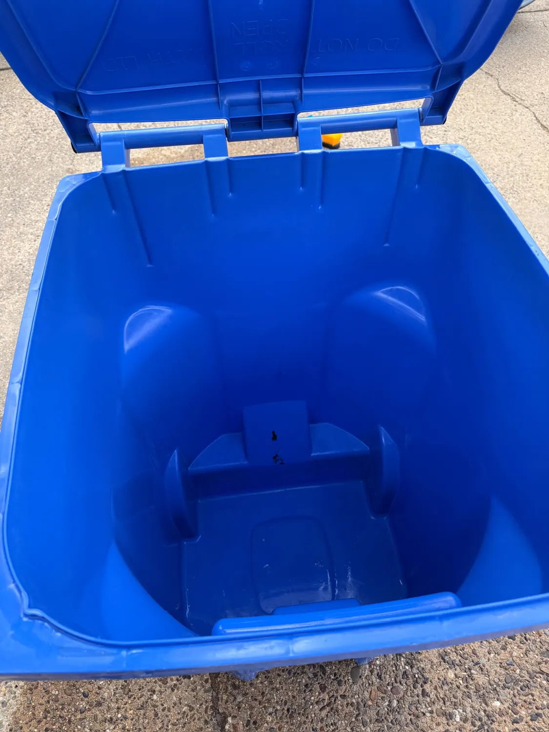 Inside of a trash bin after cleaning
