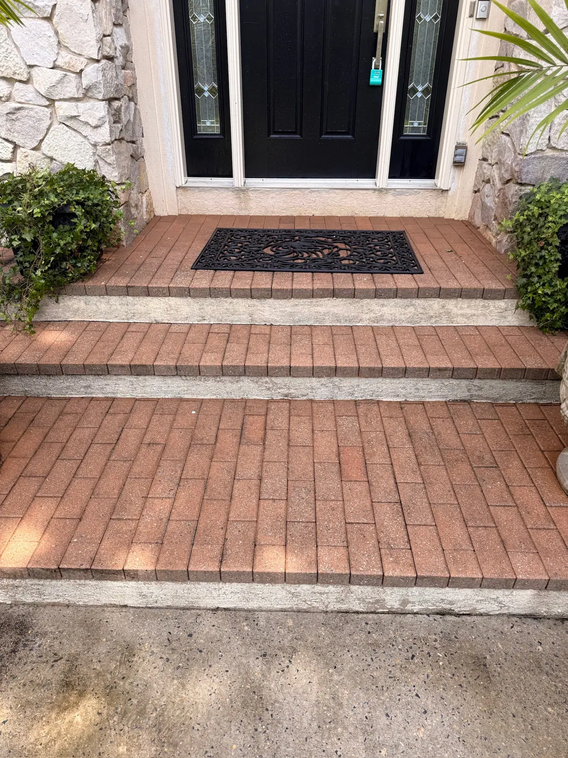 Brick front steps after pressure washing